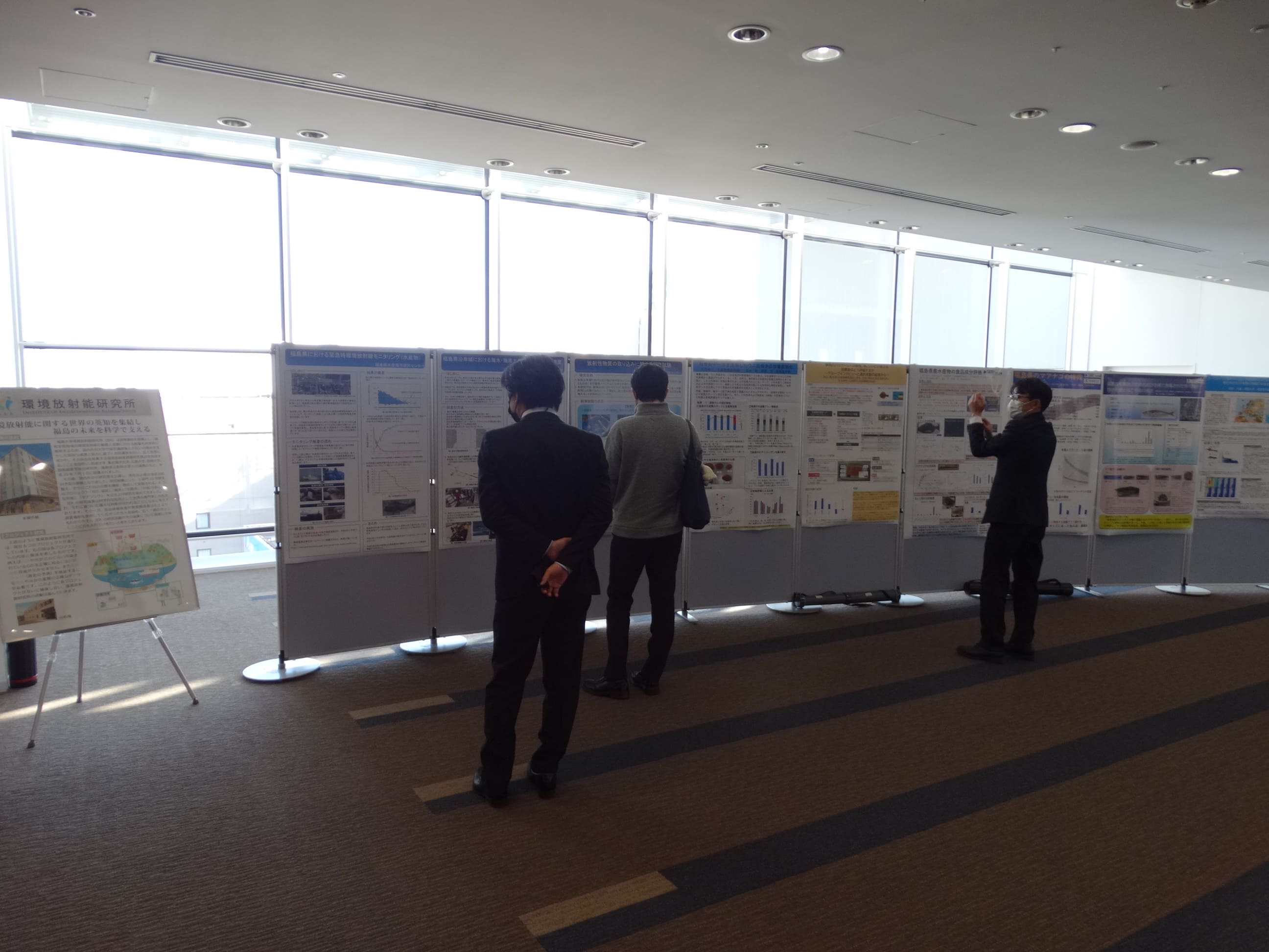 Posters of the research by the affiliated institutes were displayed outside the venue.